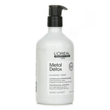 L'Oreal Metal Detox Shampoo 500ml, purifies hair by removing metal particles, ideal for color-treated and processed hair.