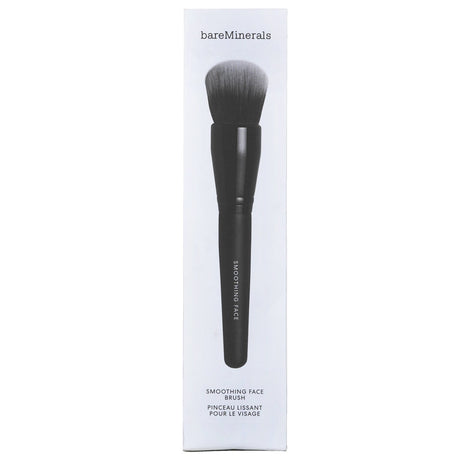 Dome-shaped BareMinerals Smoothing Face Brush for flawless blending and natural radiance in face makeup application.