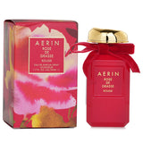 Aerin Rose De Grasse Rouge Eau De Parfum Spray in an elegant 50ml bottle, capturing rich rose and warm spice notes.