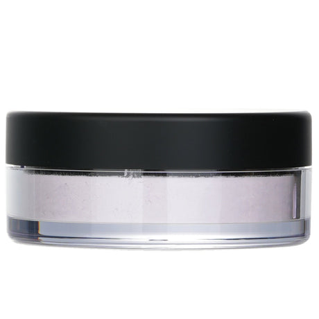 Lightweight MAC Studio Fix Loose Powder in Lavender for a flawless, airbrushed finish; absorbs oil and controls shine.