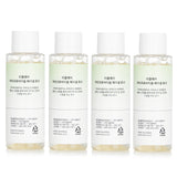Reclar Microbiome Facial Toner set of four 50ml bottles, promoting balanced and radiant skin with probiotics and key hydrating ingredients.