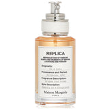 Maison Margiela Replica On a Date Eau De Toilette Spray, a romantic fragrance with floral, citrus, and musky notes in a 30ml bottle.