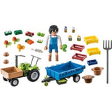 Playmobil Harvester Tractor with Trailer for transporting fresh produce, includes tipping cart and pitchfork, made from recycled materials.