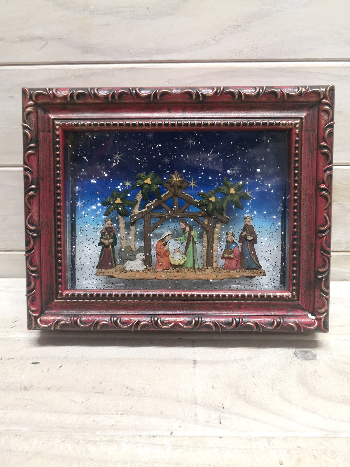 Framed Nativity artwork depicting the Holy Family, perfect for holiday decor and gift-giving, 24.5 cm W x 20 cm H.