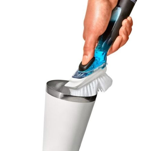 OXO Good Grips Soap Dispensing Dish Brush with button for soap release, durable bristles, scraper, and ergonomic grip.