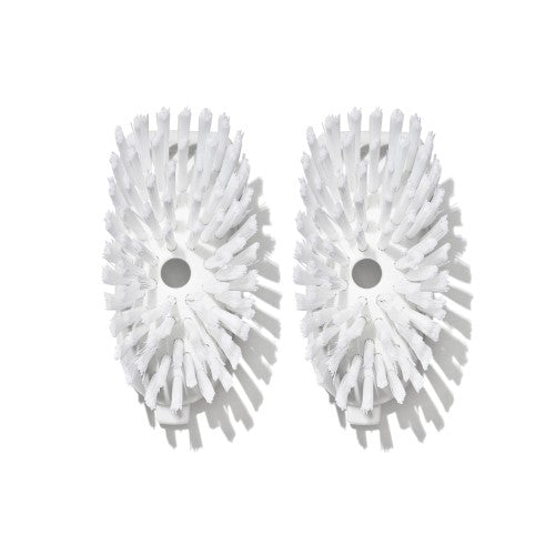 Dish brush refills featuring durable, non-stick safe bristles and built-in scraper for easy cleaning; pack of two.