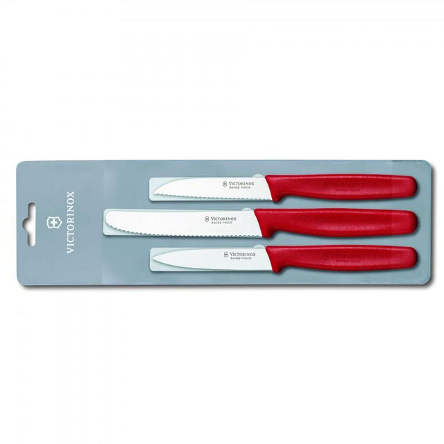 Victorinox 3-piece paring knife set in red, featuring serrated, pointed, and straight knives with ergonomic non-slip handles.