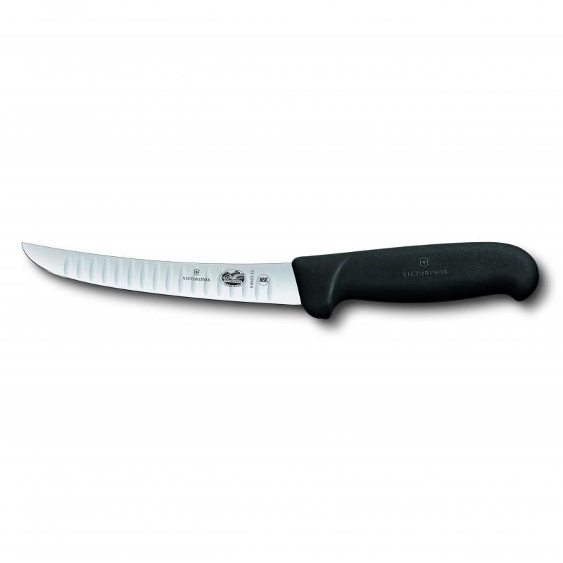 Victorinox 15cm boning knife with curved fluted blade, ergonomic handle, ideal for precise deboning and trimming tasks.