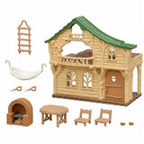 Sylvanian Families Lakeside Lodge with furniture, hammock, and secret slide for baby figures, perfect for imaginative play.