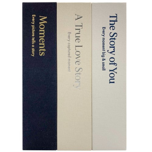 Elegant black photo album with slip-in pockets for 160 4x6" photos, featuring embossed silver foil and a protective box.