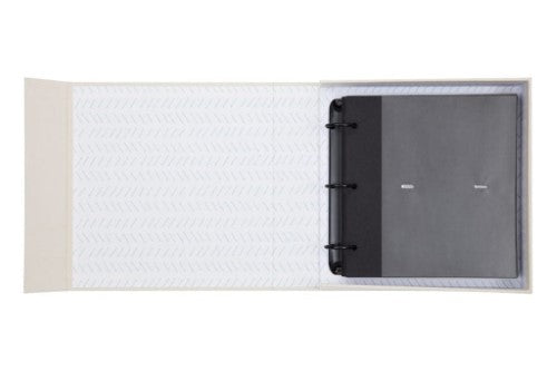 Elegant black cloth-covered photo album with slip-in pockets for 160 cherished 4x6 photos, housed in a stylish magnetic box.