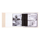 Elegant black cloth photo album showcasing "A True Love Story," holds 160 photos in slip-in pockets, perfect for keepsakes.