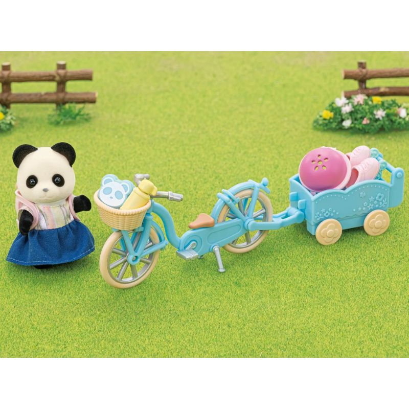 Sylvanian Families Cycle & Skate Set featuring Panda Girl Rosalina Pookie with bicycle, skates, helmet, and accessories for outdoor fun.