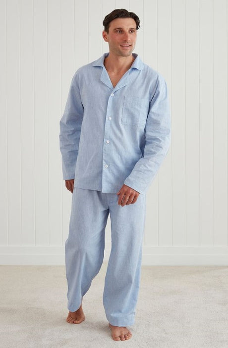 Lightweight classic pyjama set featuring a long sleeve button-up top and elasticated pants, ethically made from certified fabrics.