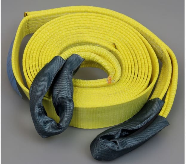 9m Vehicle Tow Strop with 7500kg breaking strain, ideal for off-road recovery and emergencies, featuring durable and visible design.