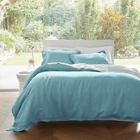 Blue Baltic Linen duvet cover set from Baksana featuring 100% European Flax, includes a super king cover and two pillowcases.