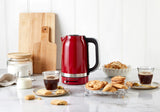 Electric kettle in Empire Red with 1.7L capacity, stainless steel interior, variable temperature control, and drip-free spout.