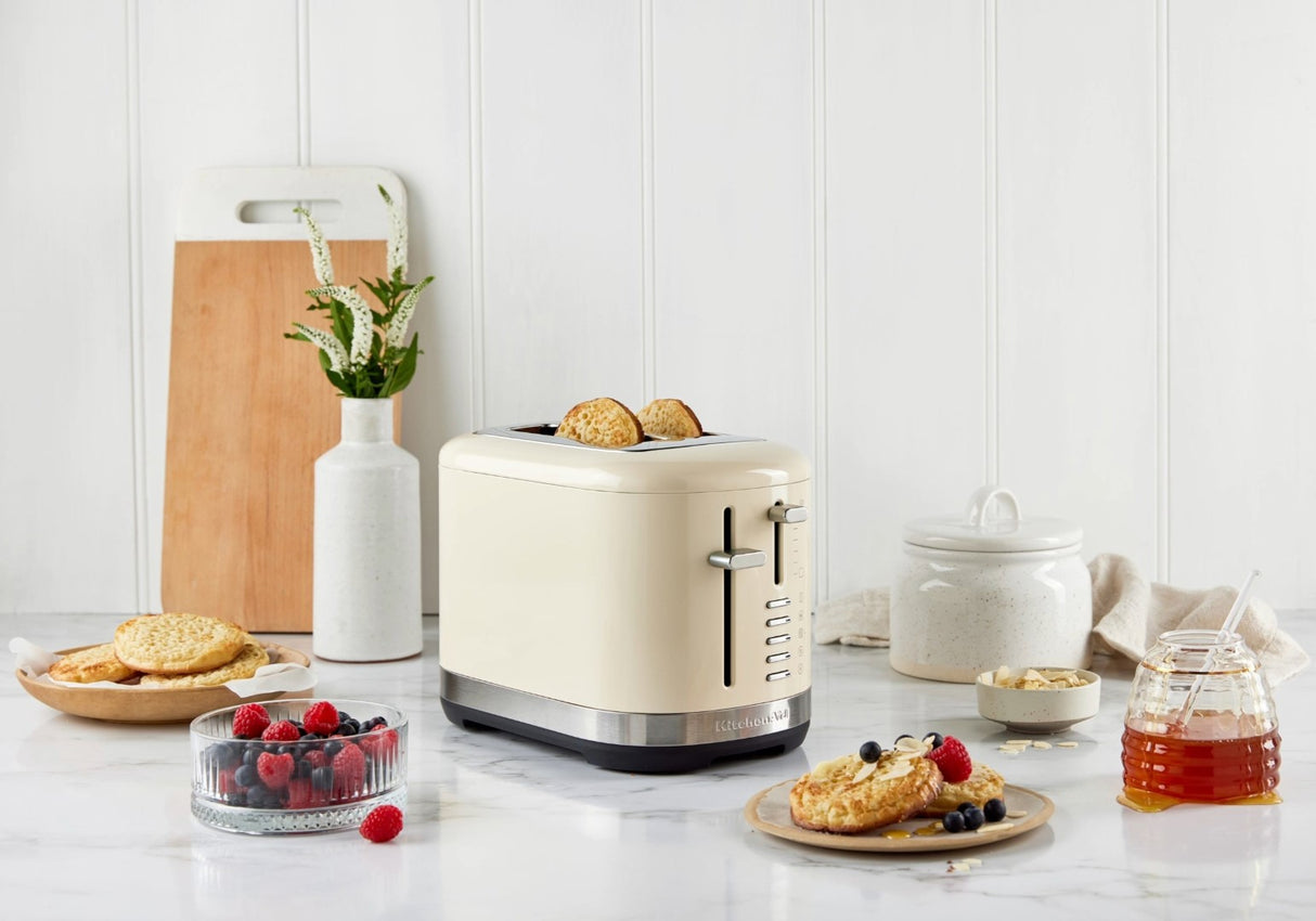 Stylish KitchenAid 2 Slice Toaster in Almond Cream with extra wide slots and 7 shade settings for perfect toast.