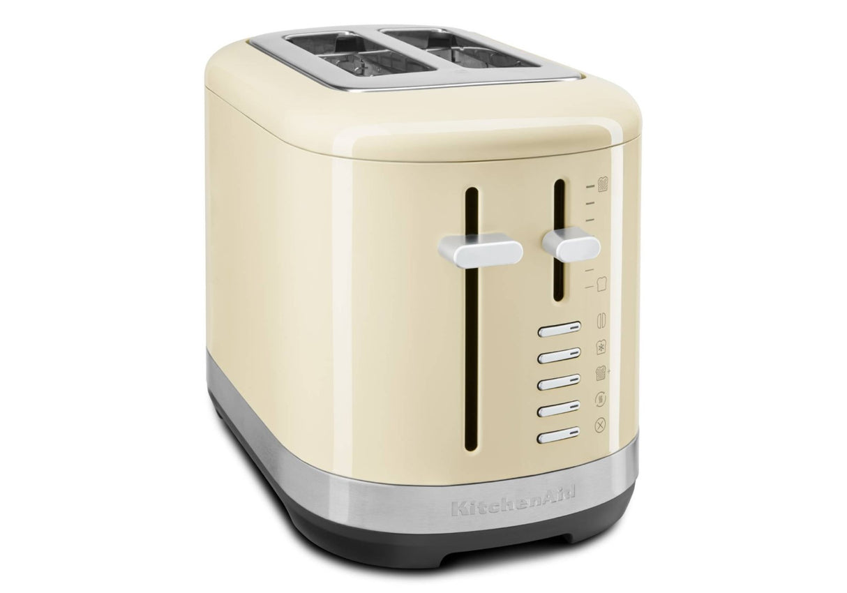 Almond Cream 2 Slice Toaster by KitchenAid with extra wide slots, 7 shade settings, and versatile functions for perfect toast.