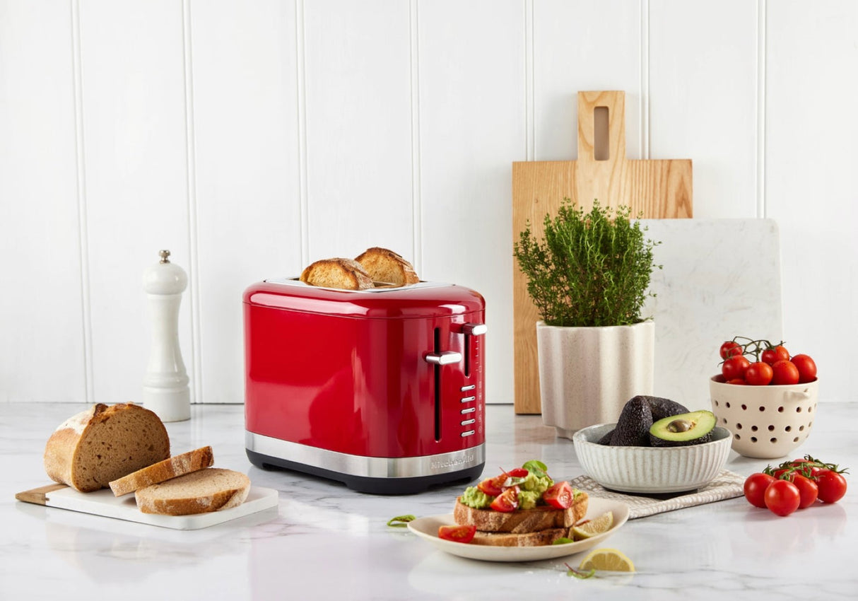 KitchenAid 2 Slice Toaster in Empire Red with extra wide slots and 7 shade settings for versatile toasting options.