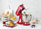 Artisan Tilt Head Stand Mixer in Empire Red, 4.7L capacity, 10 speeds, 5 accessories, and 2 stainless steel bowls.