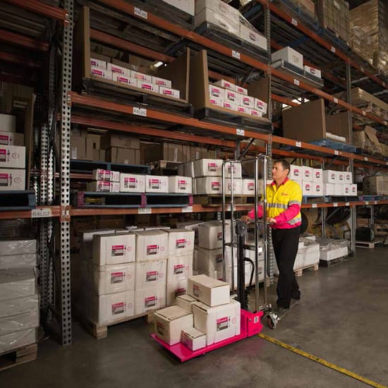 Challenger Manual Lifter Trolley for safe and efficient material handling, featuring adjustable tynes and heavy-duty castors.