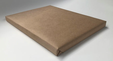 Premium white greaseproof paper sheets, 600 x 970mm, 1000 per ream; perfect for baking, cooking, and food prep.