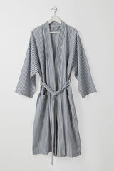 Lightweight Luca kimono robe in dark blue stripes on white, featuring pockets, waist tie, and made from 100% OEKO-TEX® cotton.