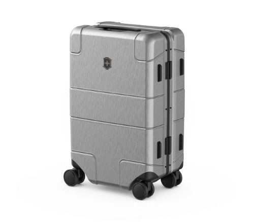 Sleek silver Victorinox Lexicon Carry-On with aluminum frame, recessed wheels, TSA locks, and 30-liter capacity for effortless travel.