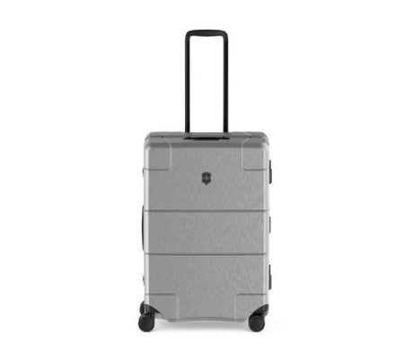 Sleek silver Victorinox Lexicon luggage with aluminum frame, dual TSA locks, and 72-liter capacity for modern travelers.