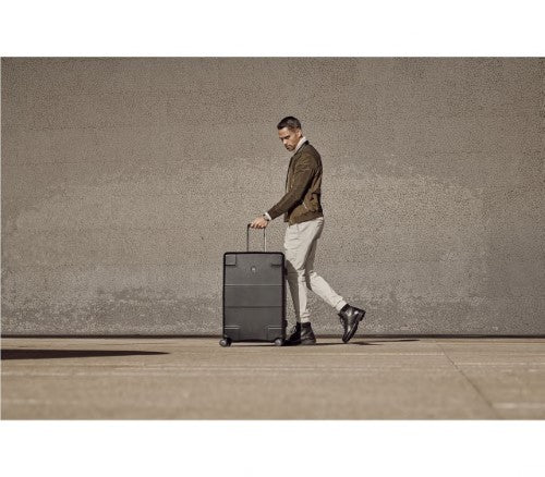 Sleek black Victorinox Lexicon hardside luggage with aluminum frame, dual TSA locks, and spacious 96L capacity for effortless travel.