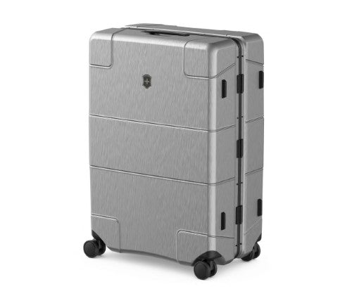 Sleek silver Victorinox Lexicon Framed Large suitcase with aluminum frame, 96L capacity, dual TSA locks, and smooth spinner wheels.