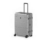 Sleek silver Victorinox Lexicon hardside suitcase with aluminum frame, 96L capacity, dual TSA locks, and smooth-rolling spinner wheels.