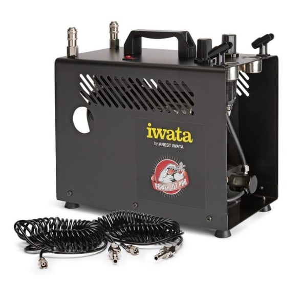 Iwata Air Brush Compressor Power Jet Pro, featuring dual pressure regulators, moisture filters, and a robust twin-pump motor for artists.