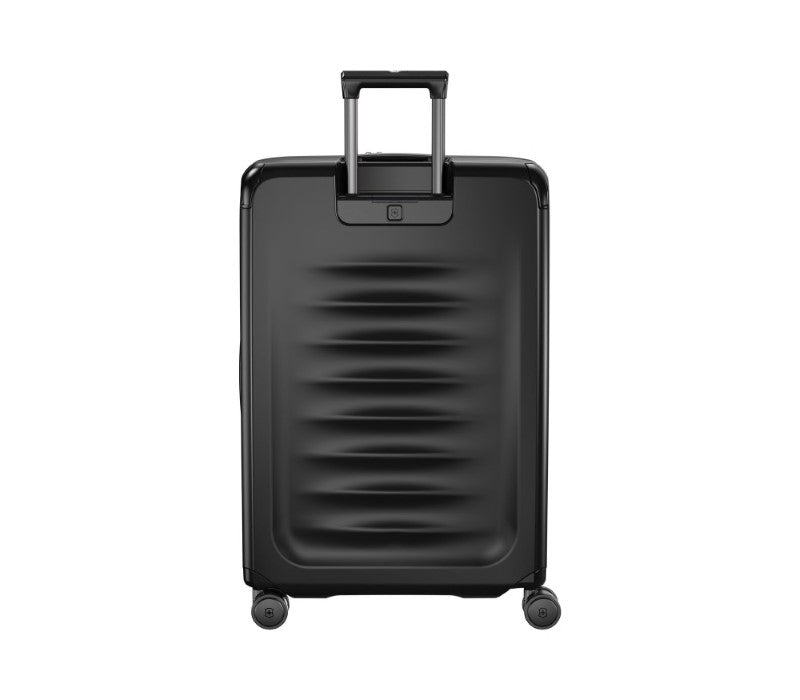 Black Victorinox Spectra 3.0 expandable suitcase with durable polycarbonate, smooth-rolling wheels, and spacious interior pockets.