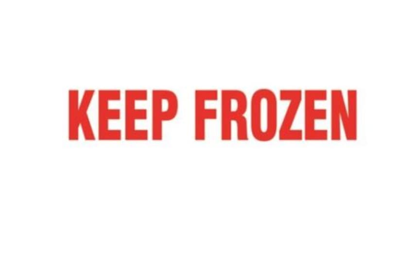"Bright 'Keep Frozen' shipping labels on a roll, 30mm x 127mm, ensuring safe transport of perishable goods."