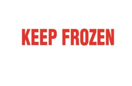 "Bright 'Keep Frozen' shipping labels on a roll, 30mm x 127mm, ensuring safe transport of perishable goods."