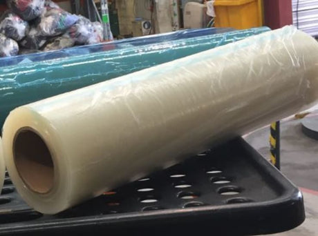 Clear surface protection film roll, 1000mm x 100m, ideal for shielding floors and furniture from dust and scratches.