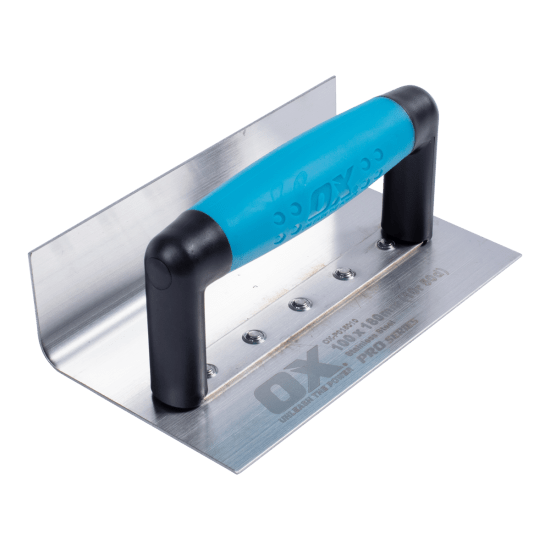 Stainless steel coving trowel with a 4"x7" blade and ergonomic handle for smooth, professional concrete finishes.