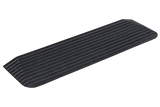 Heavy-duty rubber access ramp, 1100 x 320 x 38mm, ensuring wheelchair-friendly transitions with ribbed traction surface.