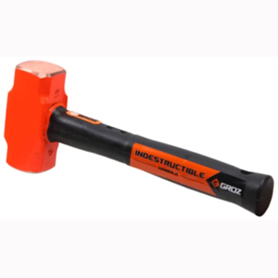 Groz 4lb copper head hammer with indestructible handle, ergonomic grip, spark-free use, ideal for mining and metal forming.