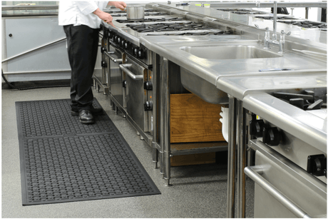 Kleen Thru Plus Mat, 850 x 600mm, slip-resistant nitrile rubber mat for kitchens, featuring anti-fatigue and drainage holes.