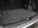Robust PVC car boot mat (1400 x 1100mm) with a non-slip surface, checker pattern, and easy cleaning for SUVs.