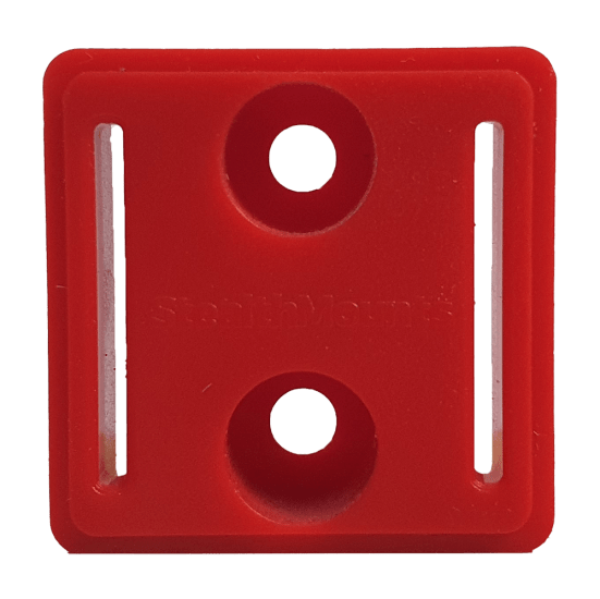 Tool mount spacers in red for Milwaukee tools, providing extra clearance for clips and hooks to enhance workspace organization.