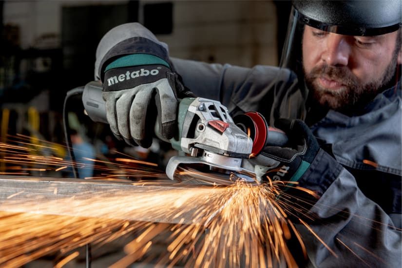 Metabo 125mm angle grinder with 1100W power, quick disc change, and low-vibration handle for efficient grinding and cutting.