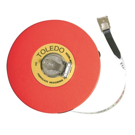 Durable 30m fibreglass measuring tape with double-sided metric markings, rubber hand strap, and smooth wind-back handle.