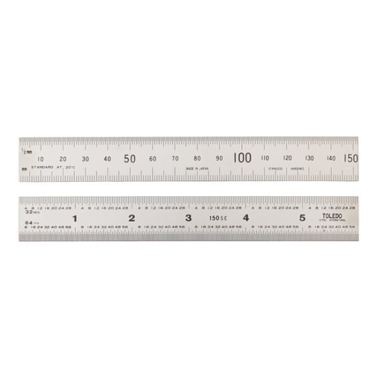 Double-sided stainless steel ruler measuring 150mm with metric and imperial graduations for precise measurements.