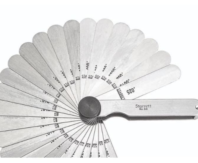 Precision tool for automotive and aviation, featuring 26 straight leaves for measuring thickness from .0015" to .025".