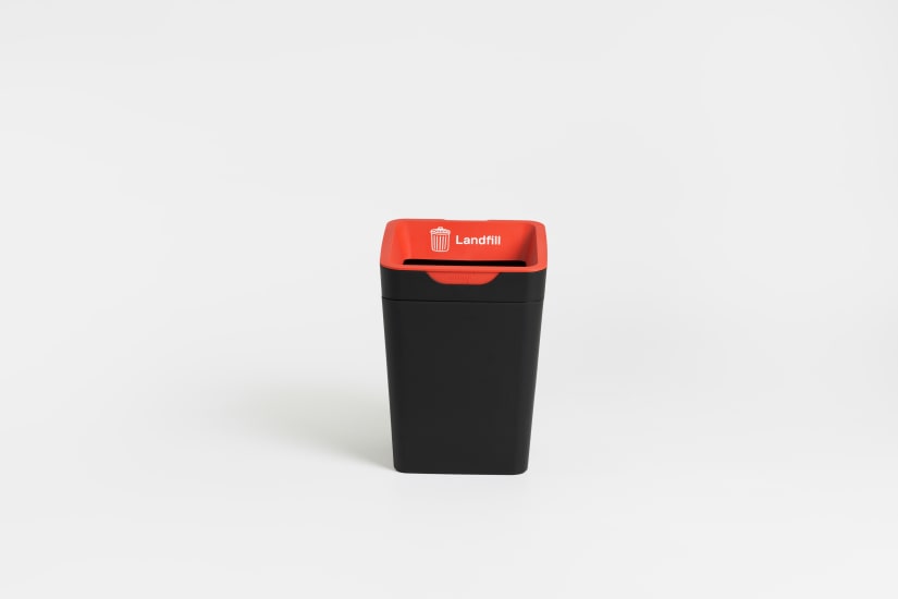 Red 20L landfill waste bin with open lid, designed for offices and kitchens, featuring a bag retainer and clear graphics for easy sorting.