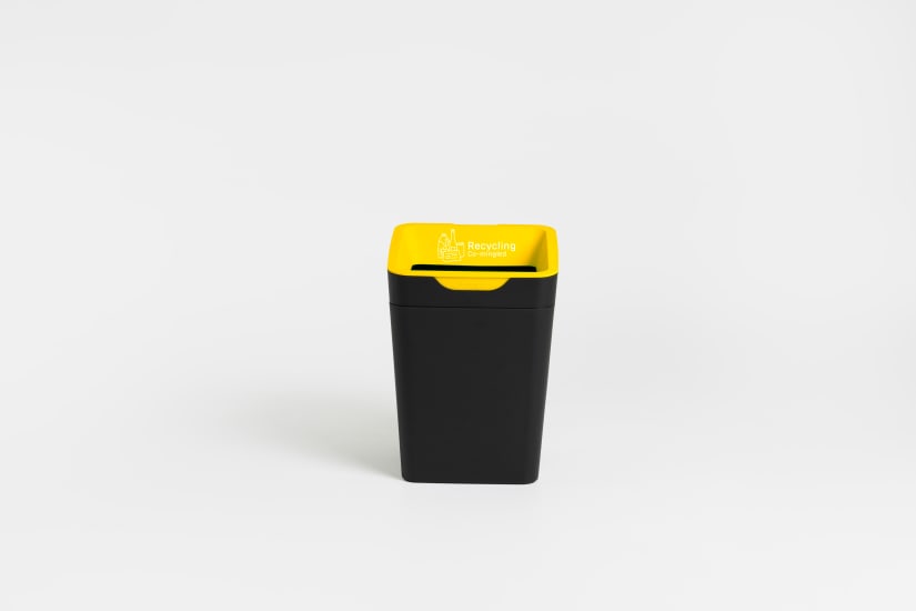 Stylish 20L yellow co-mingled bin for recycling; made from 100% recycled materials with clear sorting graphics.